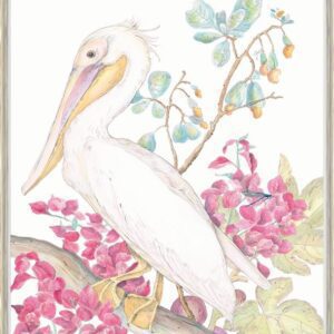A white pelican perched on a branch with pink flowers, captured beautifully in this stunning "My Mykonos Morning" pelican art print.