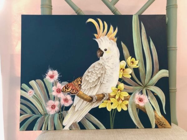 A chinoiserie-inspired painting of a Cockatoo Party sitting on a branch, perfect for art collectors seeking original art.