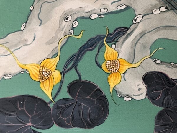 A painting of a lotus flower and an octopus.
