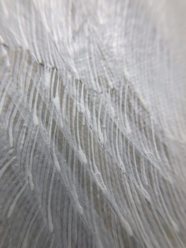 A close up of a white feather resembling the "Nothing to Egret" coastal bird painting.