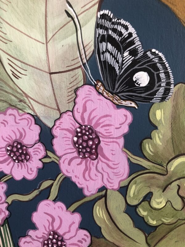 A "Beauty and the Beast" Chinoiserie Chic Tiger painting of a butterfly on a pink flower.