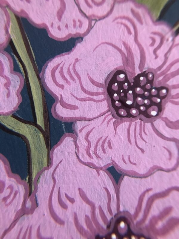 A close up of a "Beauty and the Beast" Chinoiserie Chic Tiger painting of pink flowers.