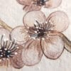 A close up of a watercolor painting of cherry blossoms.