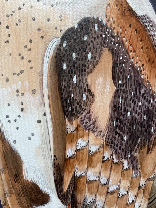 An "Owl Night Long" barn owl painting with feathers on it.