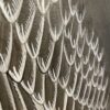 A close up of the "Eagle Opportunity" birds of prey painting of an eagle's wings.