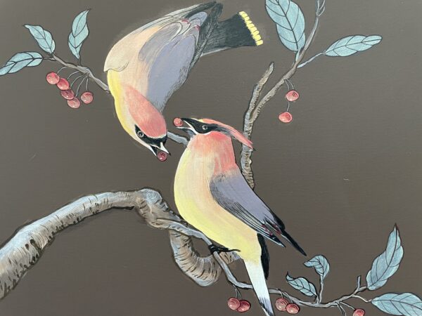 A painting of two birds with berries in mouth